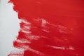 Close up Texture Red color paint on white colour canvas Brush marks stroke for paper graphic design on  background Royalty Free Stock Photo