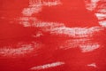 Close up Texture Red color paint on white colour canvas Brush marks stroke for paper graphic design on background Royalty Free Stock Photo