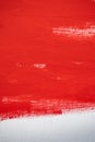 Close up Texture Red color paint on white colour canvas Brush marks stroke for paper graphic  design on background Royalty Free Stock Photo