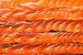 close-up texture of sliced cold smoked salmon