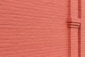 Close up texture view of a red painted antique brick wall background Royalty Free Stock Photo
