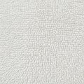 Close-up texture of a white microfiber fabric, consisting of numerous tiny loops and Royalty Free Stock Photo