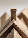 Architectural concept featuring a detailed textured model rooftop with a chimney, highlighting geometric shapes and natural Royalty Free Stock Photo