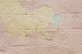 Close-up Textured background of multi-layer flaking paint on the wall. Mixing different colors of paints in the cleaved Royalty Free Stock Photo