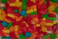 Close up textured background of multiple asserted colorful candy