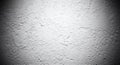 Textured White Plaster Wall Background with Dramatic Spotlight Royalty Free Stock Photo