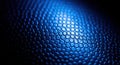 Close up textured blue surface with hexagonal pattern and dramatic lighting Royalty Free Stock Photo