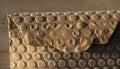 Close-up of Textured Bubble Wrap and Cardboard Packaging Royalty Free Stock Photo