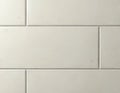 Close-up of textured ceramic tile wall featuring subtle color variations in matte finish. Seamless, repeatable pattern, Royalty Free Stock Photo