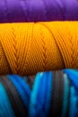 Close up of textured colorful rolls of thread