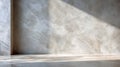 Textured Concrete Wall with Dramatic Sunlight Shadows and Shadow Play on Floor Royalty Free Stock Photo
