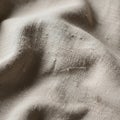 Close-up of a textured fabric, possibly linen, with a plain weave pattern. The material Royalty Free Stock Photo