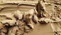 Close Up of Textured Mud Surface with Grainy Sand in Natural Brown Color Royalty Free Stock Photo