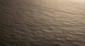 Close-up of a textured paper surface with a uniform, slightly rough finish. The light Royalty Free Stock Photo