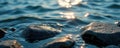 Close up textured rocks, lake ripples reflecting light, close up, outdoor, reflection Royalty Free Stock Photo