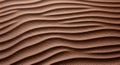 Close-up of a textured surface featuring wavy, undulating patterns resembling sand dunes. The Royalty Free Stock Photo