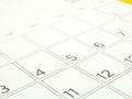date numbers in grid of desk calendar page, close-up in 4th of July