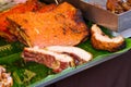 Close up Thai roasted crispy pork on banana leaf