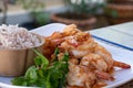 Close up Thai dish. Fresh shrimp stir fry with garlic sauce. Eat together with Thai rice Royalty Free Stock Photo