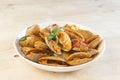 Close up Thai food, fried clams with chili paste and sweet basil on a wooden table Royalty Free Stock Photo