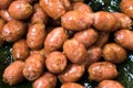 Close up of Thai Isaan style sausages on banana leaf