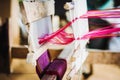 Close up of Thai Silk weaving on a traditional loom Royalty Free Stock Photo