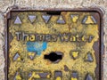 A close-up of a Thames water fire hydrant cover. London, UK. Royalty Free Stock Photo