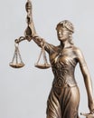 close-up themis is goddess of justice statuette on dark background. symbol of law with scales Royalty Free Stock Photo