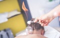 Close-up of a therapist giving cupping treatment. Female laying on chest and relaxing Cupping massage. Royalty Free Stock Photo