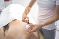 Close-up of a therapist giving cupping treatment. Female laying on chest and relaxing Cupping massage. Royalty Free Stock Photo