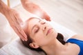 Therapist Performing Reiki Healing Treatment On Woman Royalty Free Stock Photo