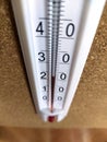A close-up of a thermometer. Air heating indicator. The thermometer shows the room temperature Royalty Free Stock Photo