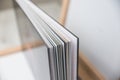 Close up of thick and rigid wedding album pages in a book with acrylic cover