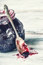 Close up of thick sweet strawberry jam with old spoon. Royalty Free Stock Photo