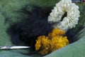 Close up things on lotus leaf during tonsure on ordination ceremony. Royalty Free Stock Photo