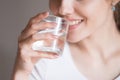 Close up of thirsty woman enjoying pure water Royalty Free Stock Photo