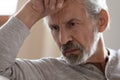 Close up thoughtful frustrated mature man thinking about problems Royalty Free Stock Photo