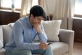 Close up thoughtful serious man using phone, having problem Royalty Free Stock Photo