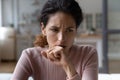Close up thoughtful upset woman thinking about problems alone