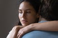 Close up thoughtful woman hugging man, thinking about relationship problems Royalty Free Stock Photo