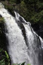 Close up of Three Bears Falls, also known as Upper Waikani Falls, cascading down a cliffisde in Maui