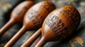 Close Up of Three Carved Wooden Spoons with Floral Patterns Royalty Free Stock Photo