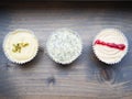 Close up of three diffrent colorful cupcakes