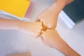 Close up of three fists hitting team or young people putting the Royalty Free Stock Photo