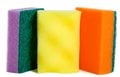 Foam sponges for washing dishes stand behind each other isolated on white background Royalty Free Stock Photo