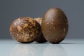 Close-up of three funny colored brown Easter eggs Royalty Free Stock Photo