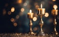 Close up of three golden burning candles in vintage candlesticks on the wooden table with sparkling glitter. Copy space.