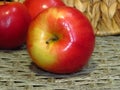 Close up of three juicy red yellow apples. Organic healthy fruit, ripe apples crop.