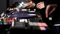 Close up of three men DJs playing electronic party music on vinyl cd usb player in the studio. Art. Side view of male Royalty Free Stock Photo