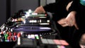 Close up of three men DJs playing electronic party music on vinyl cd usb player in the studio. Art. Side view of male Royalty Free Stock Photo